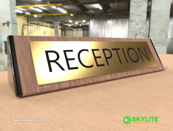 engraved brass reception sign on wood 2 1