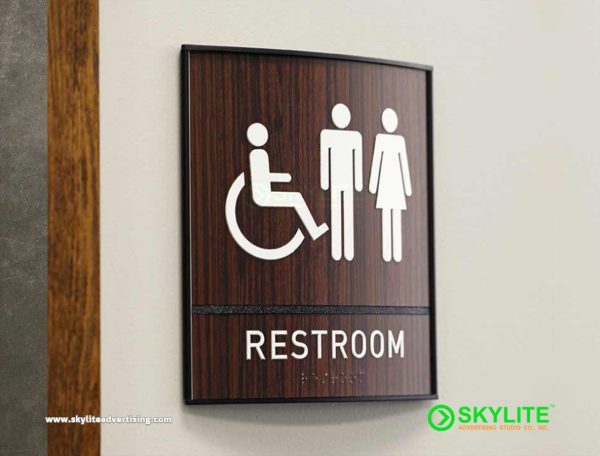 restroom sign curved wood 1
